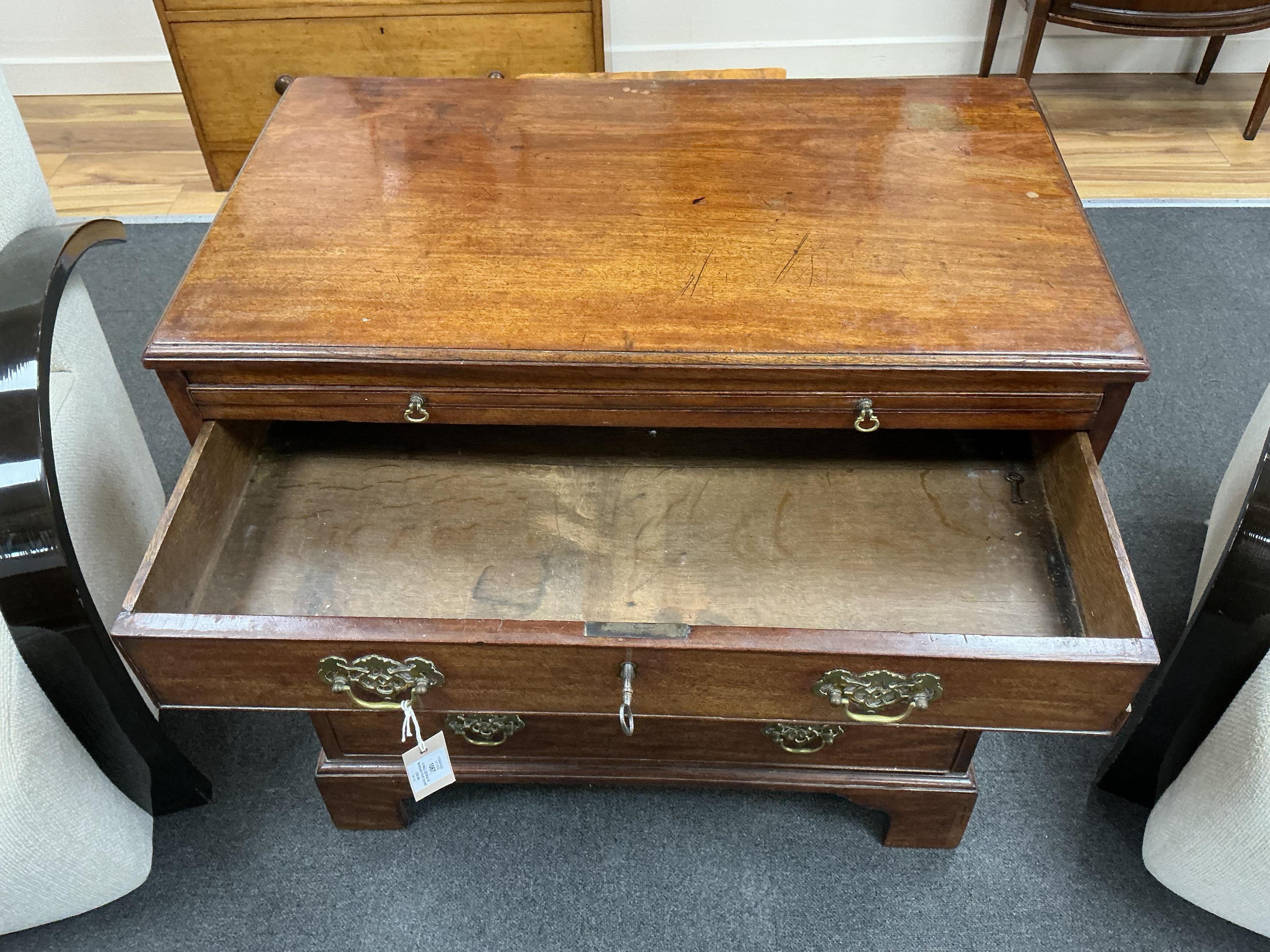 A small George III mahogany four drawer chest with brushing slide, width 78cm, depth 46cm, height 79cm
